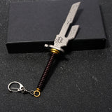 Metal keychain sword with a spring on a black background
